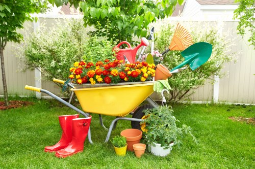Segregated garden waste containers ready for recycling at a residential property