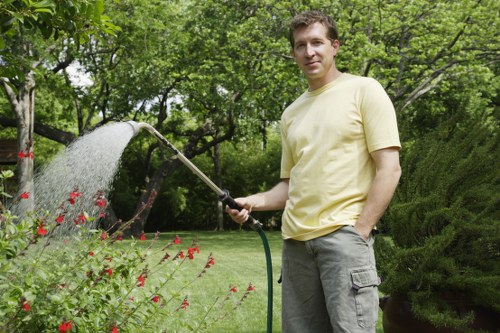 Summer garden care with lush green plants in Barnes